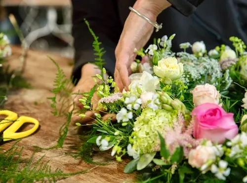 Phyllis arranging a fresh gift bouquet